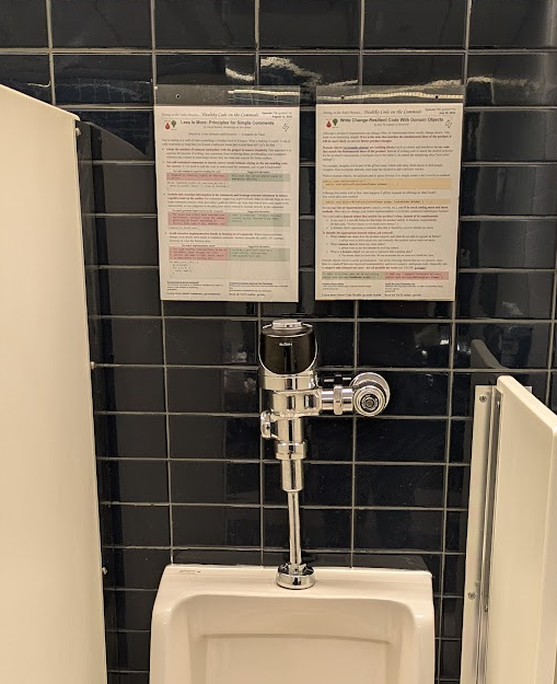 Photo of TotT posted in a bathroom stall